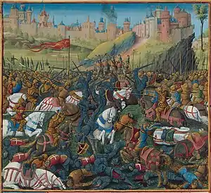 A dozen armed horsemen fight against each other on a field covered by bodies at a large castle on a hill